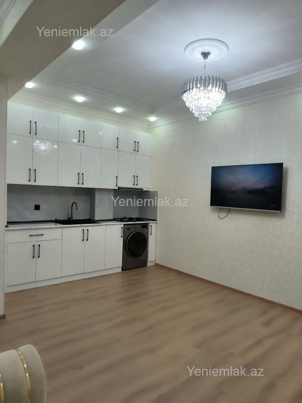 Bina evi menzil Kirayə Bakı Suraxanı rayonu Yeni Günəşli qəs. Yeni Günəşli ,yeni tikilidə 14 mərtəbəli binanın 7-ci mə