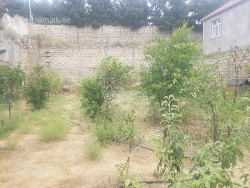 Torpaq sahəsi Satılır Bakı Nizami rayonu Su tikintide meqastore yaxin 5 sot hasarin icinde olan torpaq, butun komunika